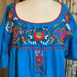 Bright cheerful vintage traditional Mexican dress.